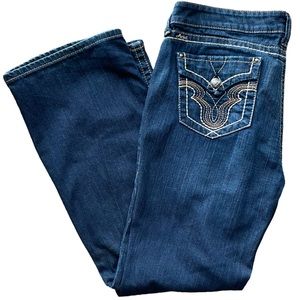 Ariat Ruby women’s blue jeans pocket w/ buttons and stitching embellishments 33S